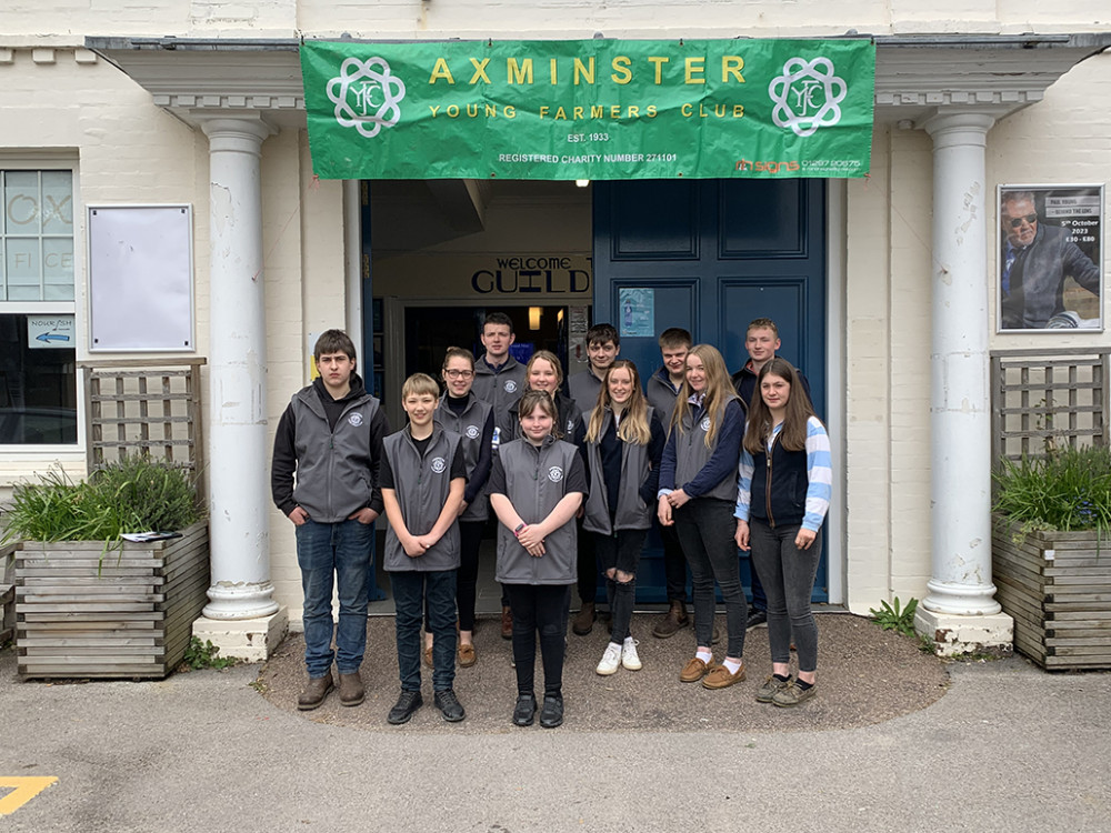 Members of Axminster Young Farmer's Club pictured outside the Guildhall in Axminster where they organised a Big Brwsakfast which raised £@1,750 for two charities