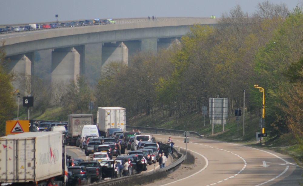 Traffic waits as Suffolk police deal with incident at top of Orwell Bridge (Picture: Nub News)