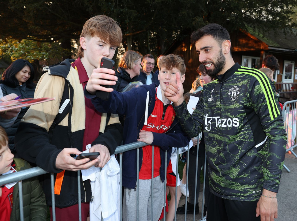 Manchester United key-man Bruno Fernandes with the red's faithful Manchester United key-man Bruno Fernandes with the red's faithful