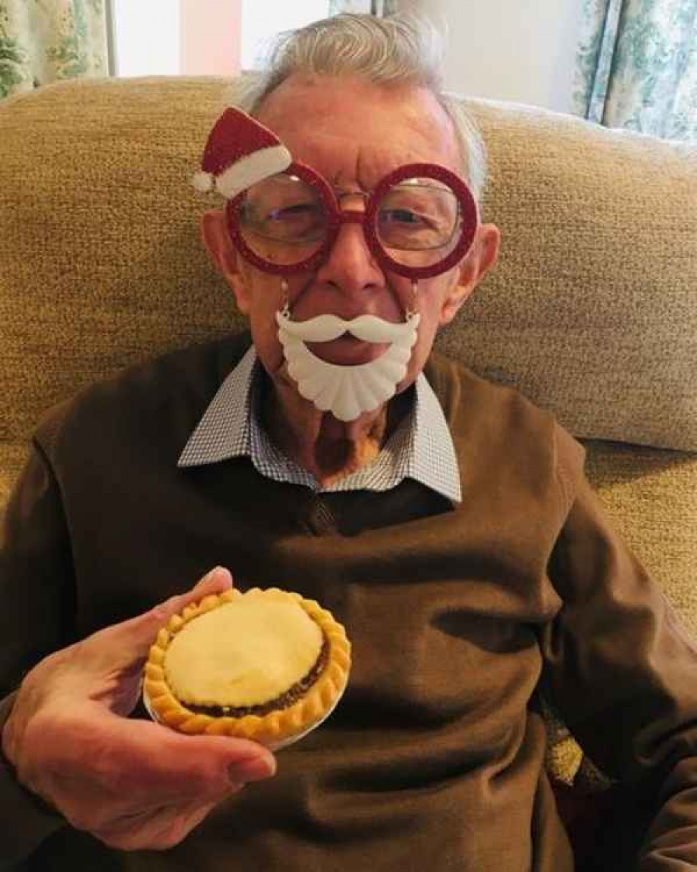 A local senior citizen receiving his mince pie from the Devonshire Bakery as part of Home Instead's Santa to a Senior campaign A local senior citizen receiving his mince pie from the Devonshire Bakery as part of Home Instead's Santa to a Senior campaign