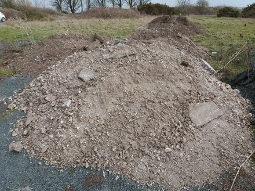 The fly-tipped waste on land at the former Askers Hotel, near Dorchester