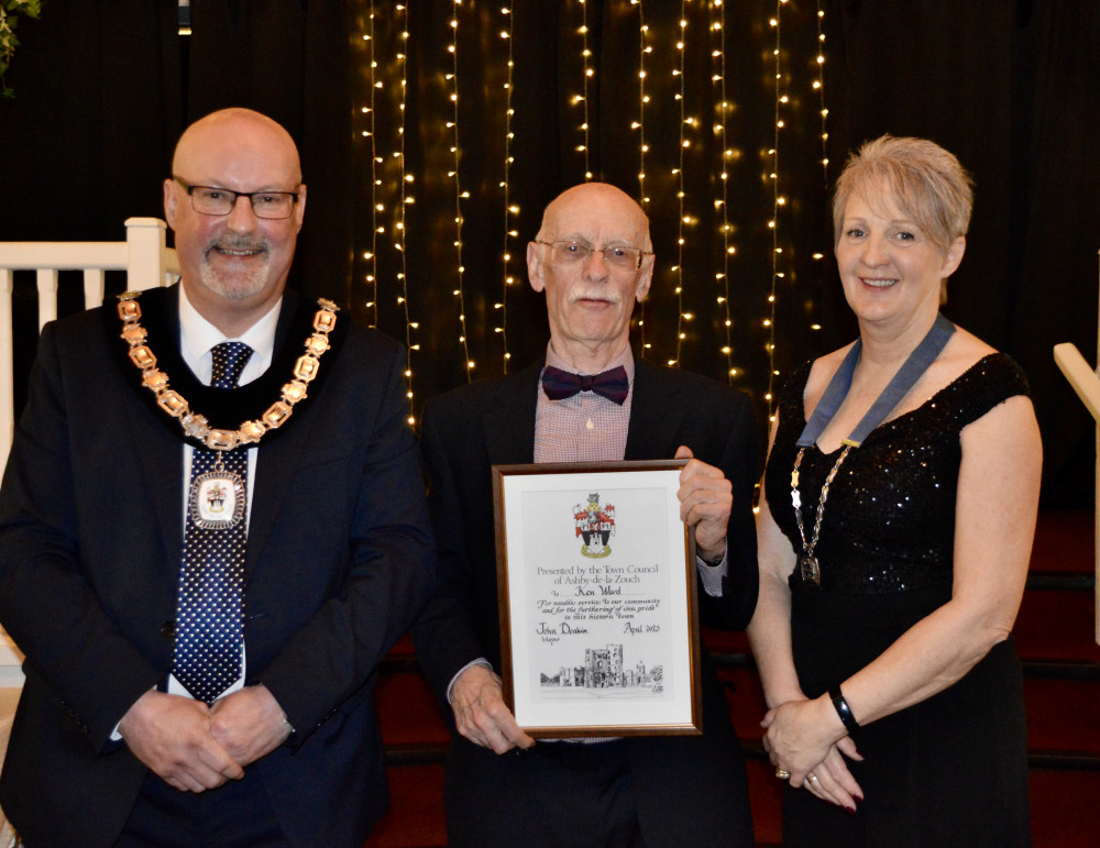 Ken Ward is presented with his award by Mayor of Ashby, Cllr John Deakin, and Mayoress, Karen Deakin. Photo: Ashby de la Zouch Town Council