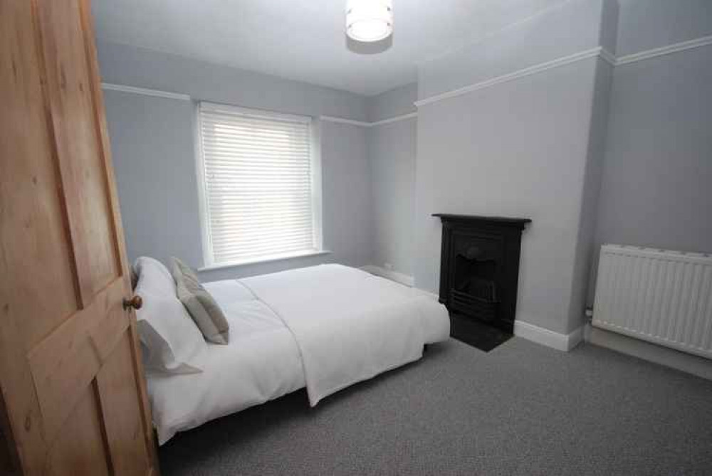 Double bedroom with fireplace