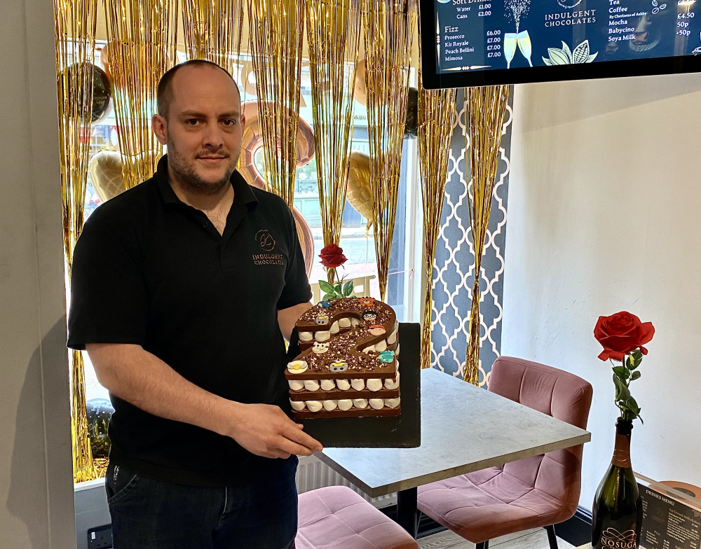 Keith Tiplady and Indulgent Chocolates' birthday cake - can you guess the weight? Photos: Ashby Nub News