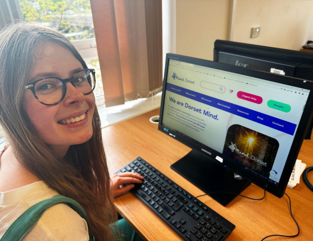 Dorset Mind Marketing co-ordinator, Abigail Hole, using the new website