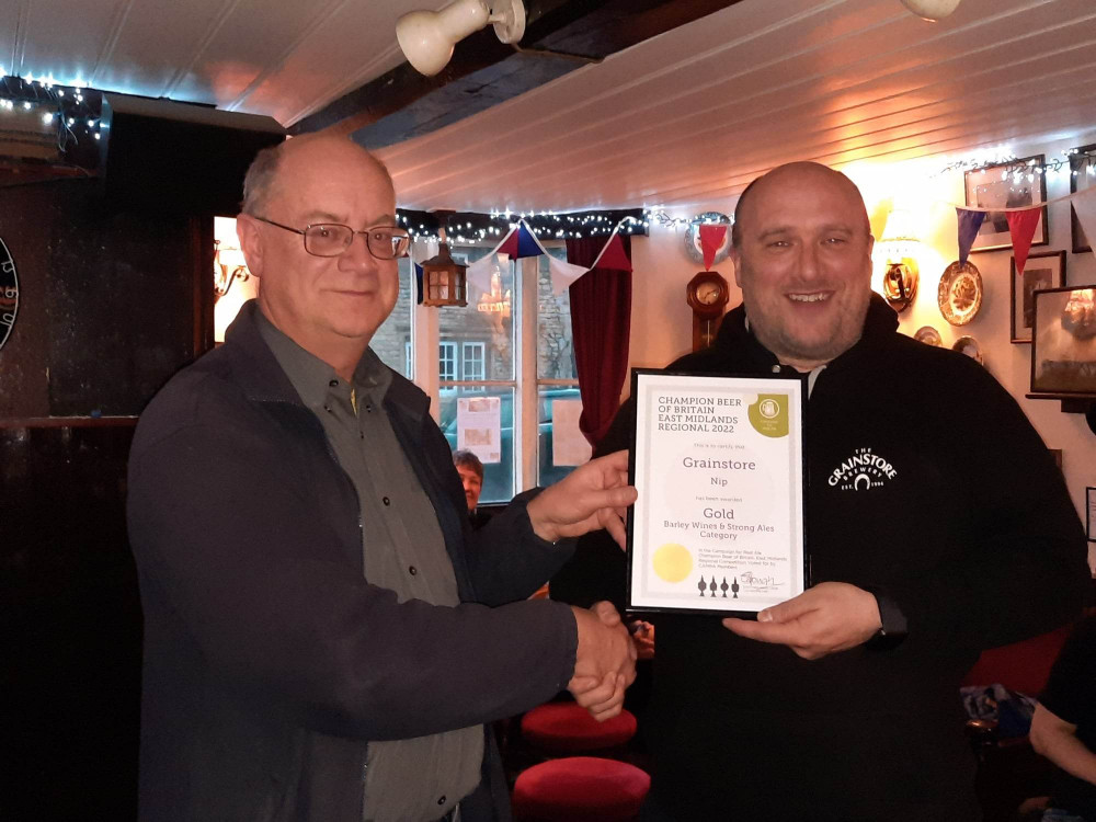 Peter at The Grainstore recently accepted CAMRA awards for Nip, Rutland Beast and Rutland Panther. Image credit: Nub News. 