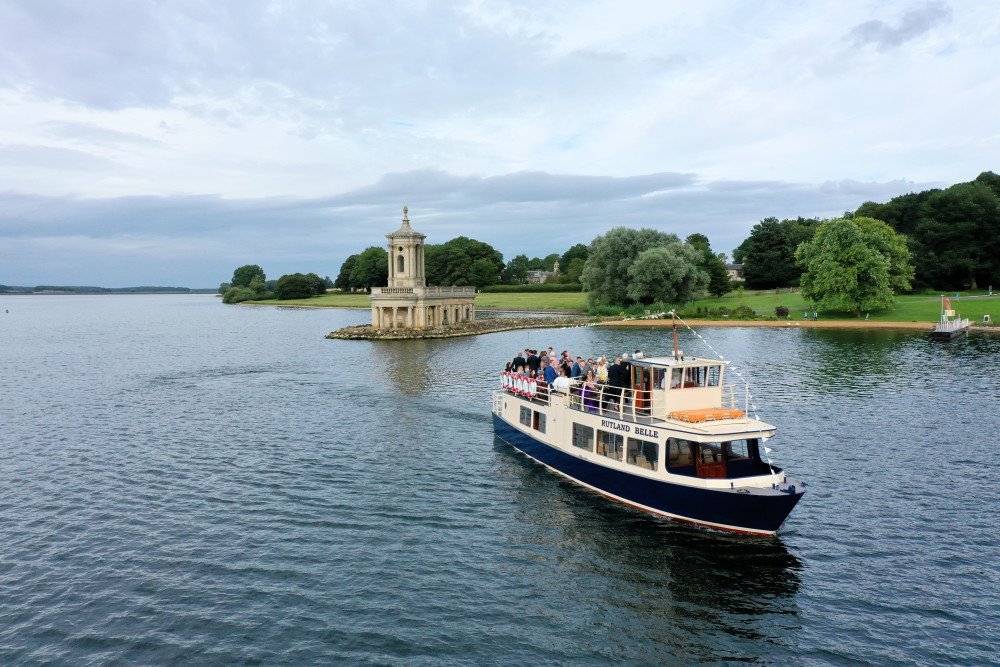 The Rutland Belle 'sailing' past Normanton Church. Image credit: @rutland_drone Instagram.