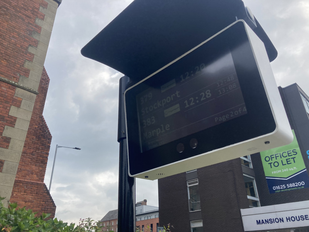 A new real-time bus timetable and new street lamps are now visible in Stockport town centre (Image - Alasdair Perry)