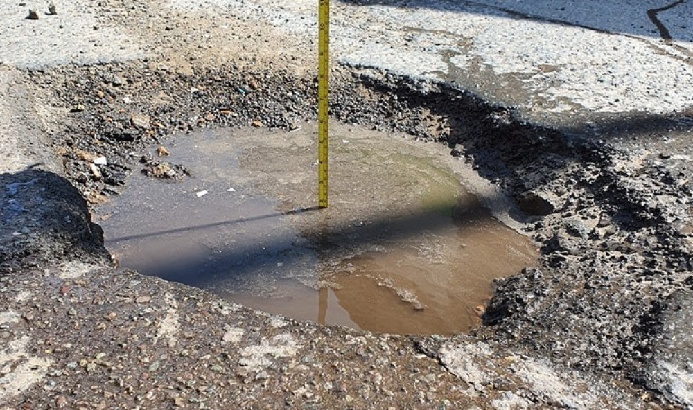 The pothole, on Cornelious Street, has been nicknamed 'Meir's new pool' (LDR).