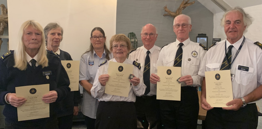 NCI Nare Point Service Awards representing 75 years of service. From left to right Mandy Boydle (10 years), Gillian Richardson (15 years), Suzanne Allin Falmouth RNLI, Virginia Malcolm (15 years), Don Garman, Station Manager, Cliff Malcolm (15 years), Bill James (5 years). Two were unable to be attend. (Image: Sue Woodyer) NCI Nare Point Service Awards representing 75 years of service. From left to right Mandy Boydle (10 years), Gillian Richardson (15 years), Suzanne Allin Falmouth RNLI, Virginia Malcolm (15 years), Don Garman, Station Manager, Cliff Malcolm (15 years), Bill James (5 years). Two were unable to be attend. (Image: Sue Woodyer)