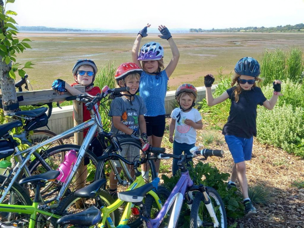 The children enjoying a break on their cycle ride (Sarah Clarke)