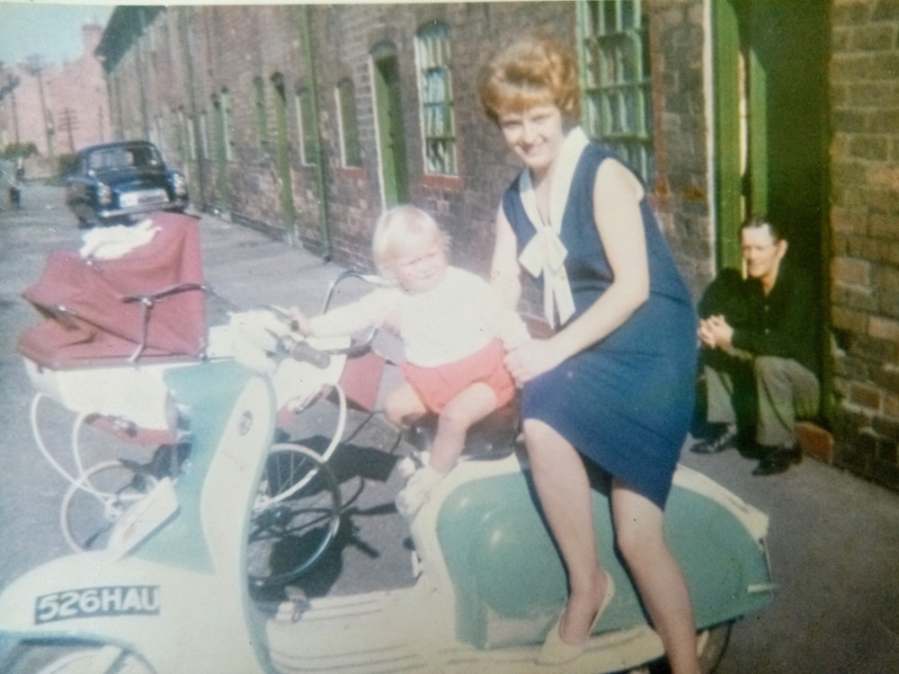 In the background, Alfred is seen sitting on the step while his daughter Julie and grandson Russell are pictured on the motorbike. Photo courtesy of Nottinghamshire Police.