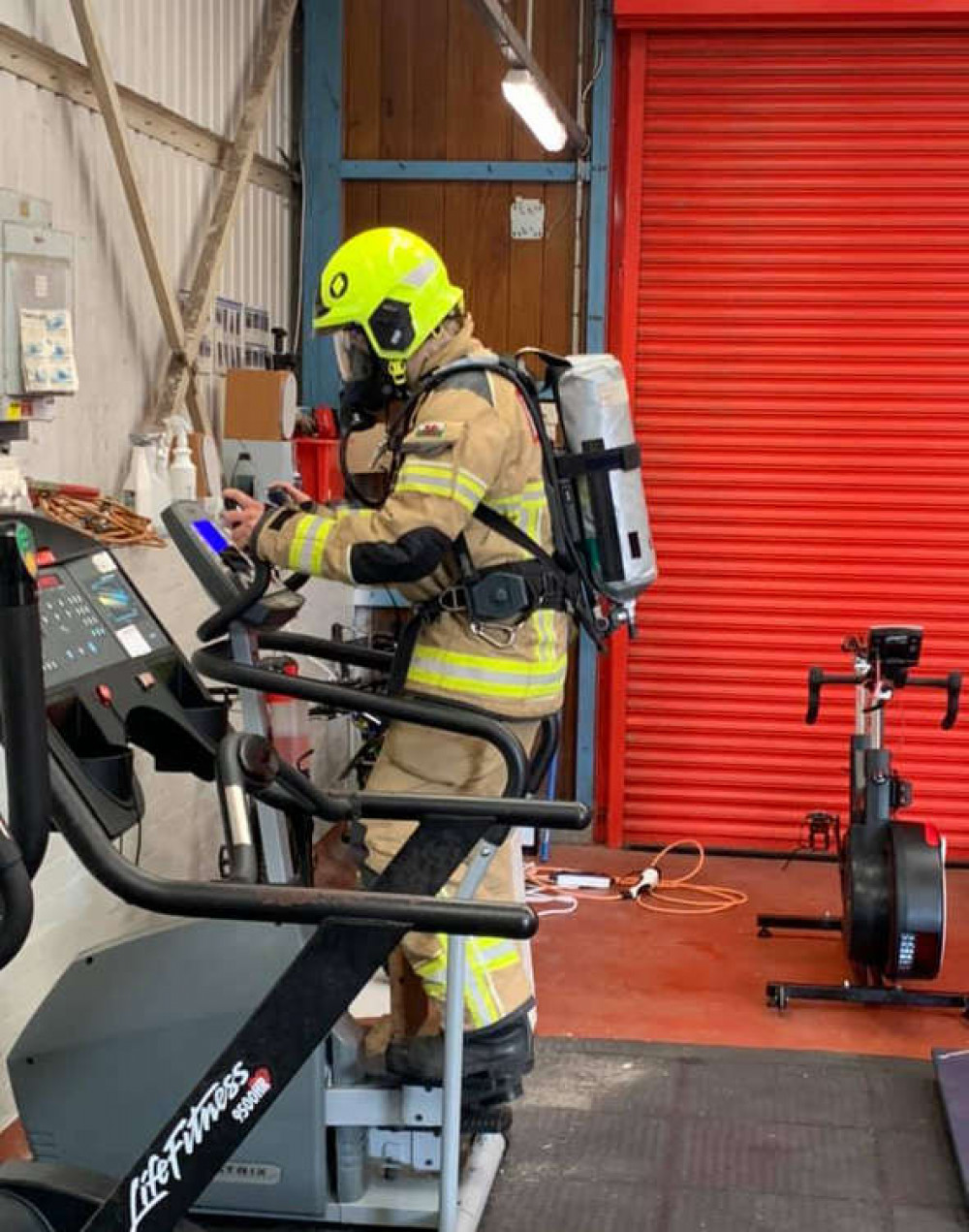 Matt Griffiths, climbs 110 flights of stairs at Cowbridge fire station as a tribute to the servicepeople of 9/11 (Image by David Thomas)