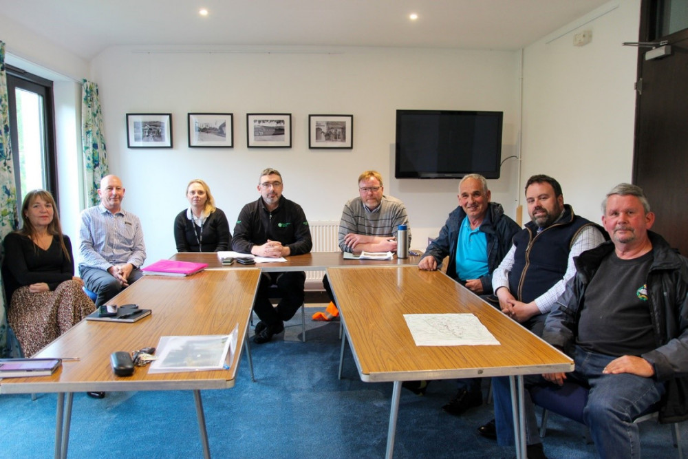 West Dorset MP Chris Loder, villagers, and representatives from the Enviornment Agency and Wessex Water at Sydlling St Nicholas 