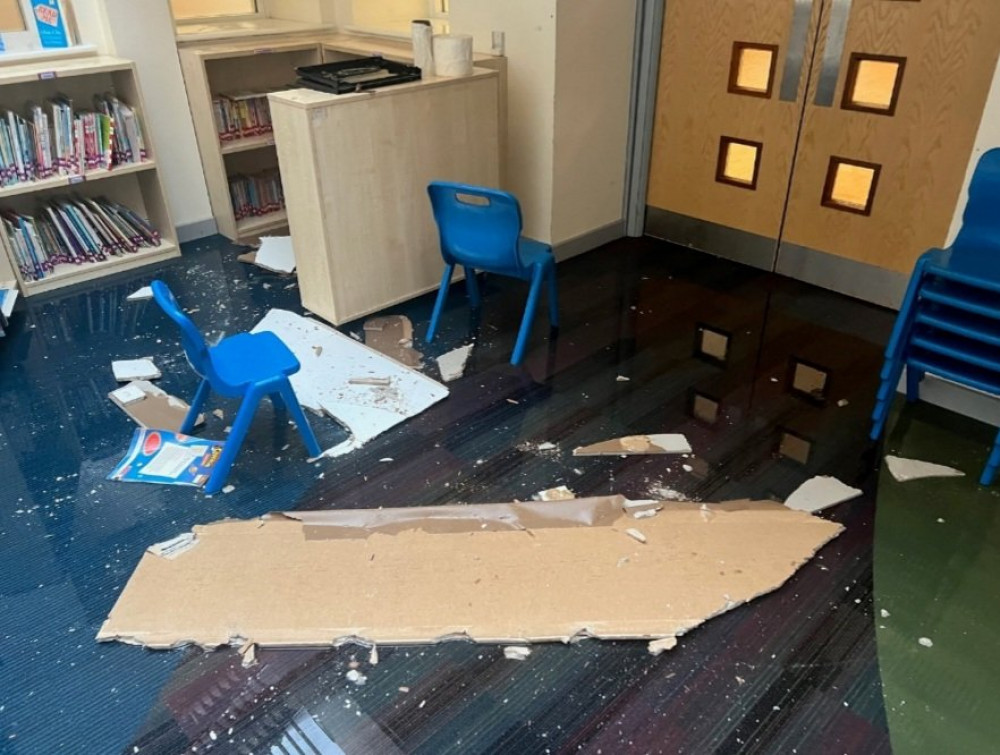 Ceiling brought down by rain at St Mary’s Primary (Credit @CFRayers)