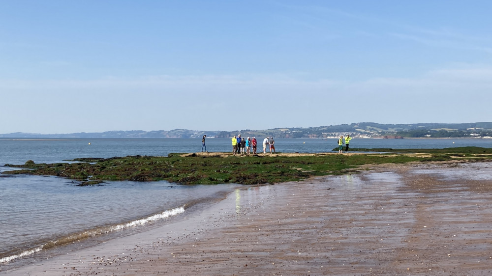 Officials and spectators during attempt at Maer Rocks, Exmouth (Nub News/ Will Goddard)