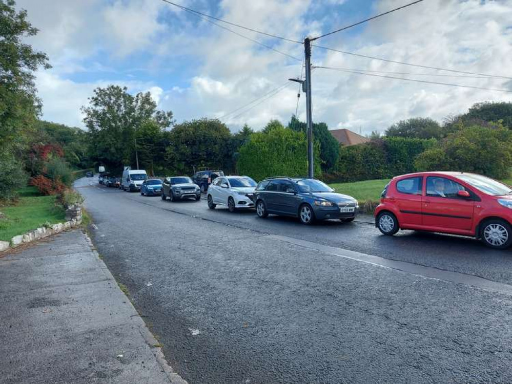 Drivers queue for Tudor Garage, Ystradowen Drivers queue for Tudor Garage, Ystradowen