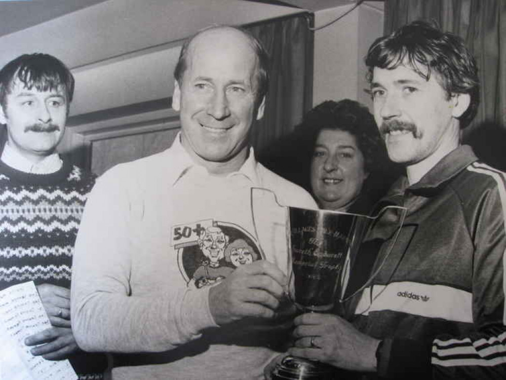 Bobby Charlton presents the Four Villages Half Marathon trophy in the '80s Bobby Charlton presents the Four Villages Half Marathon trophy in the '80s