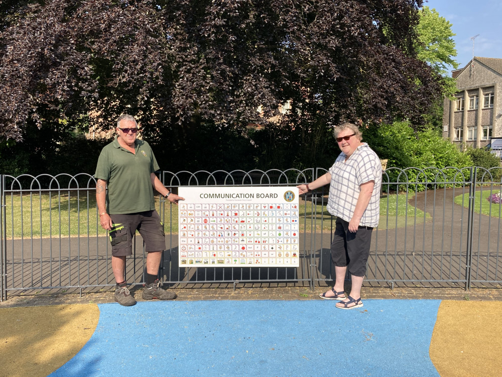 Fiona Kent Ledger, Chairman of Dorchester Town Council’s Management Committee and Iain Adshead, head gardener, inspect the first of two communication boards to be located in Dorchester