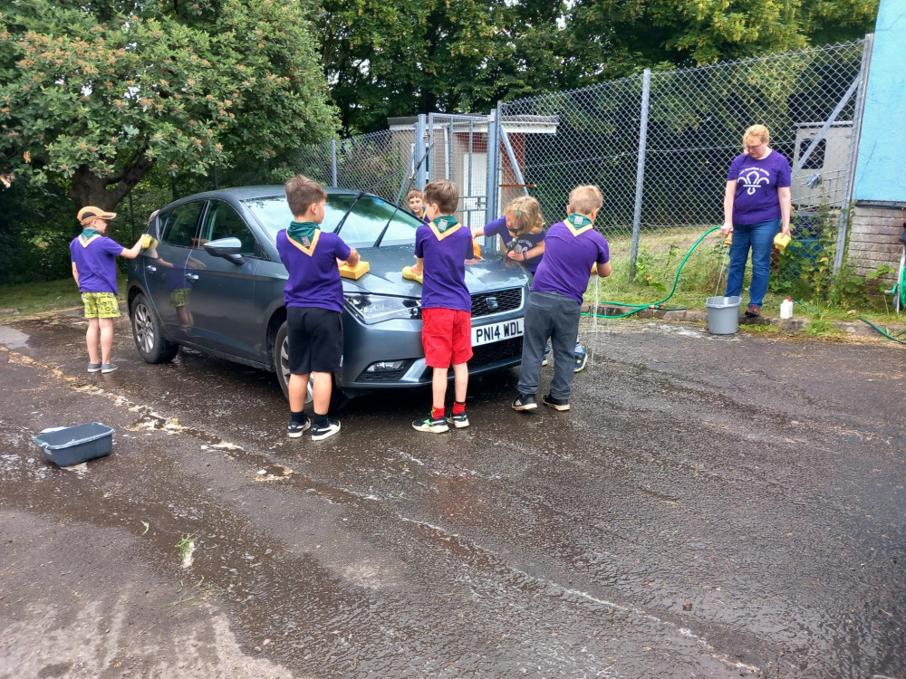 The Cub Scouts took part in a charity car wash (Credit: Jenny Beckett)