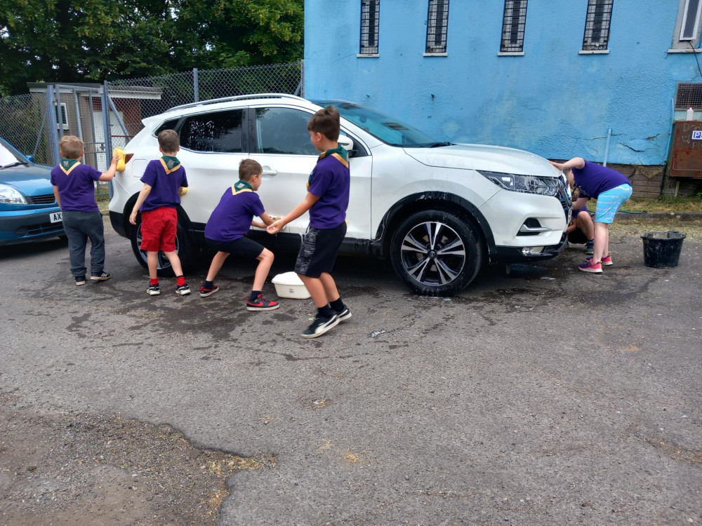 The Cub Scouts took part in a charity car wash (Credit: Jenny Beckett)