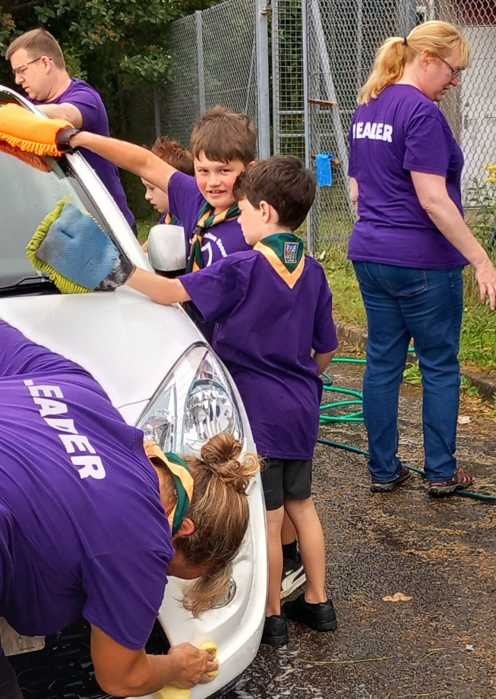 The Cub Scouts took part in a charity car wash (Credit: Jenny Beckett)