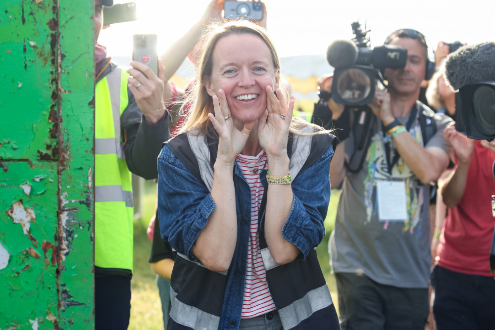  Traditionally, the 87-year-old opens the gates himself, but this morning (21/06) Emily Eavis, 43, did the honours. 