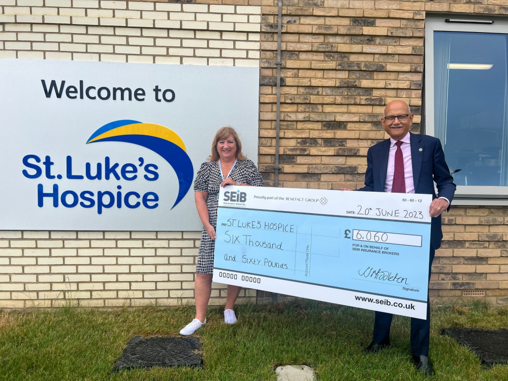 Bipin Thaker presents the cheque for £6,060 to Jackie Ross of St Luke's Hospice. Bipin Thaker presents the cheque for £6,060 to Jackie Ross of St Luke's Hospice.