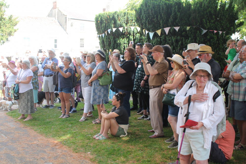 Large crowd watched the Raising of the Glove ceremony on the Minster Green Large crowd watched the Raising of the Glove ceremony on the Minster Green