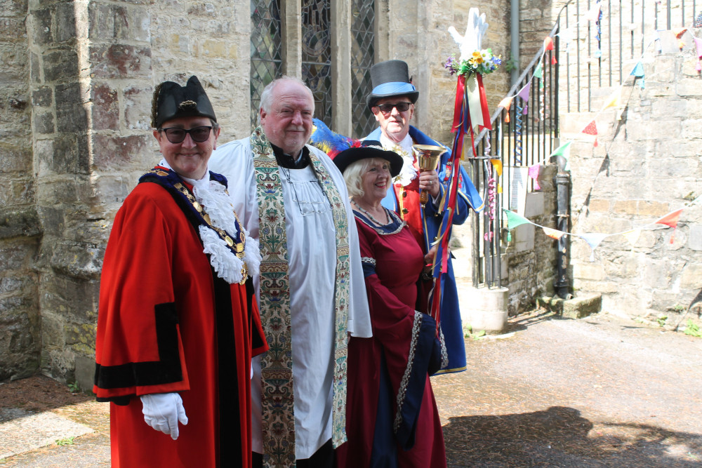 Before the ceremony, the glove was paraded around the market square by the Mayor, Cllr Jill Farrow, and official party Before the ceremony, the glove was paraded around the market square by the Mayor, Cllr Jill Farrow, and official party