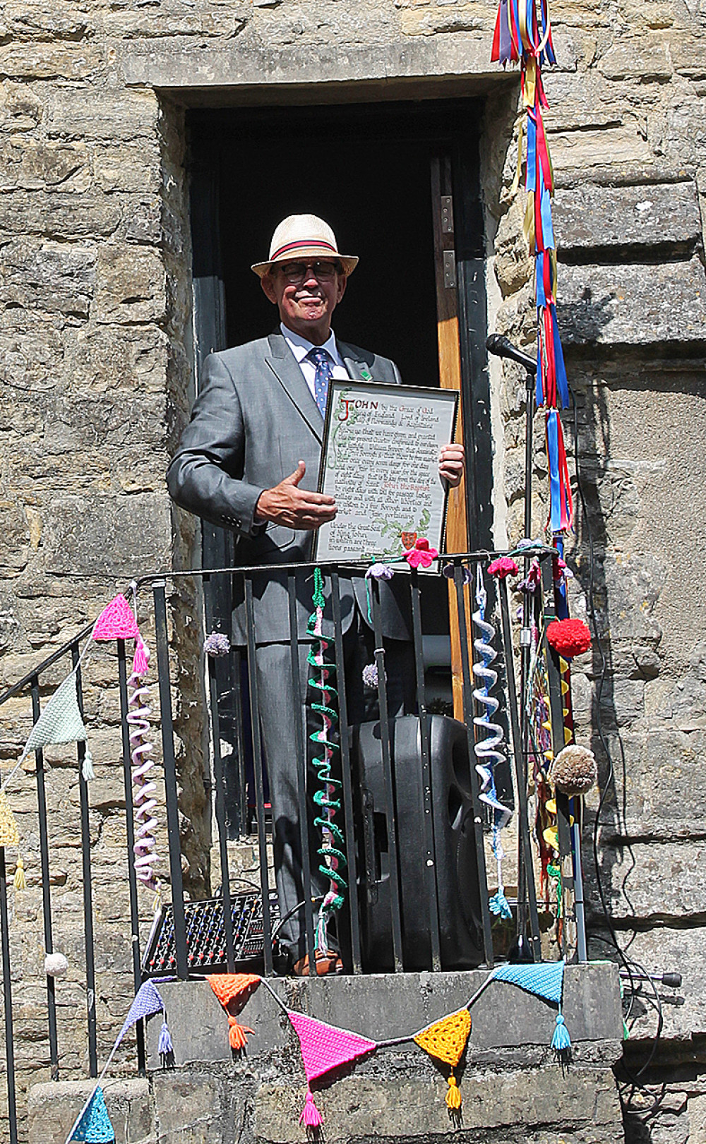 The Glove is Up! Lord of the Manor Jim Rowe is pictured with the ancient fayre charter The Glove is Up! Lord of the Manor Jim Rowe is pictured with the ancient fayre charter
