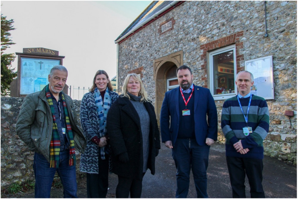 West Dorset MP Chris Loder with staff from Marshwood CofE Primary Academy