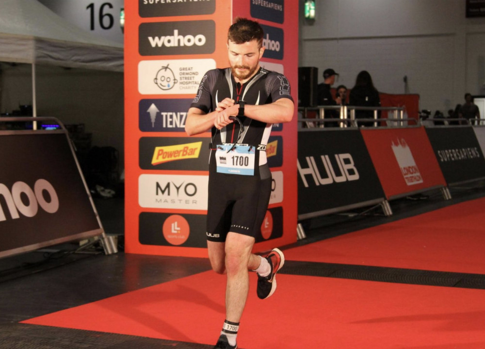 Meet James Gore: Youth charity Hitchin Phase's new school worker. PICTURE: Sporty James at the finish line of the London 2021 Triathlon. CREDIT: Phase 