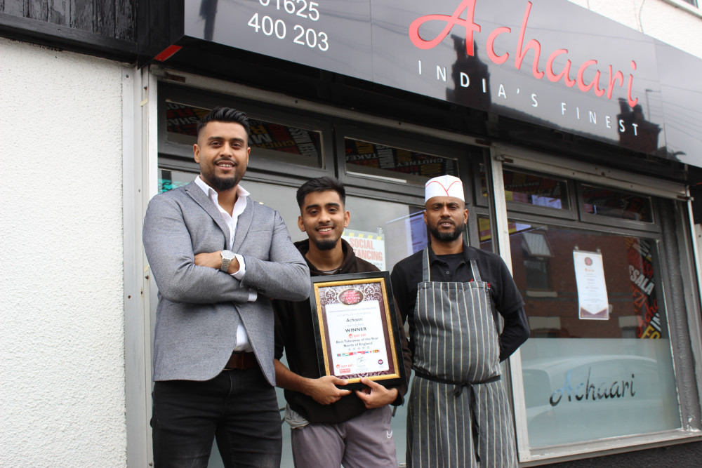 Achaari staff with a previous award. (Image - Macclesfield Nub News) 