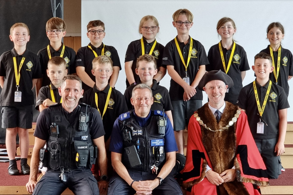 Sgt Humphreys, PCSO Thatcher and Cllr Mackay with the new Mini Police Recruits Sgt Humphreys, PCSO Thatcher and Cllr Mackay with the new Mini Police Recruits