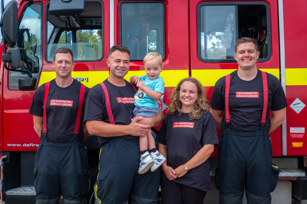 Young Idris with dad Josh Moore, mum Sammy and Dan Goetz and Paul Shillingford