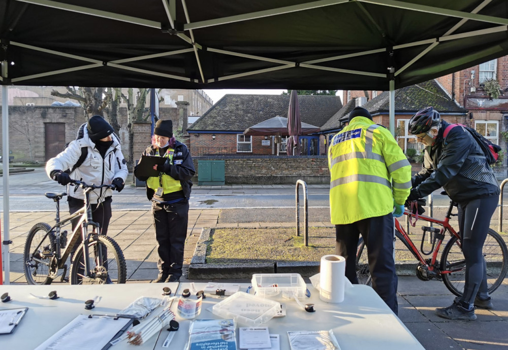 Free bike-marking event in Hitchin this weekend. PICTURE: Officers carry out a previous bike marking event. CREDIT: Herts Police  