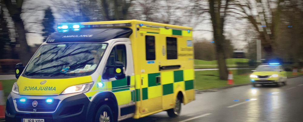 An ambulance was escorted under blue lights to Basildon Hospital. 