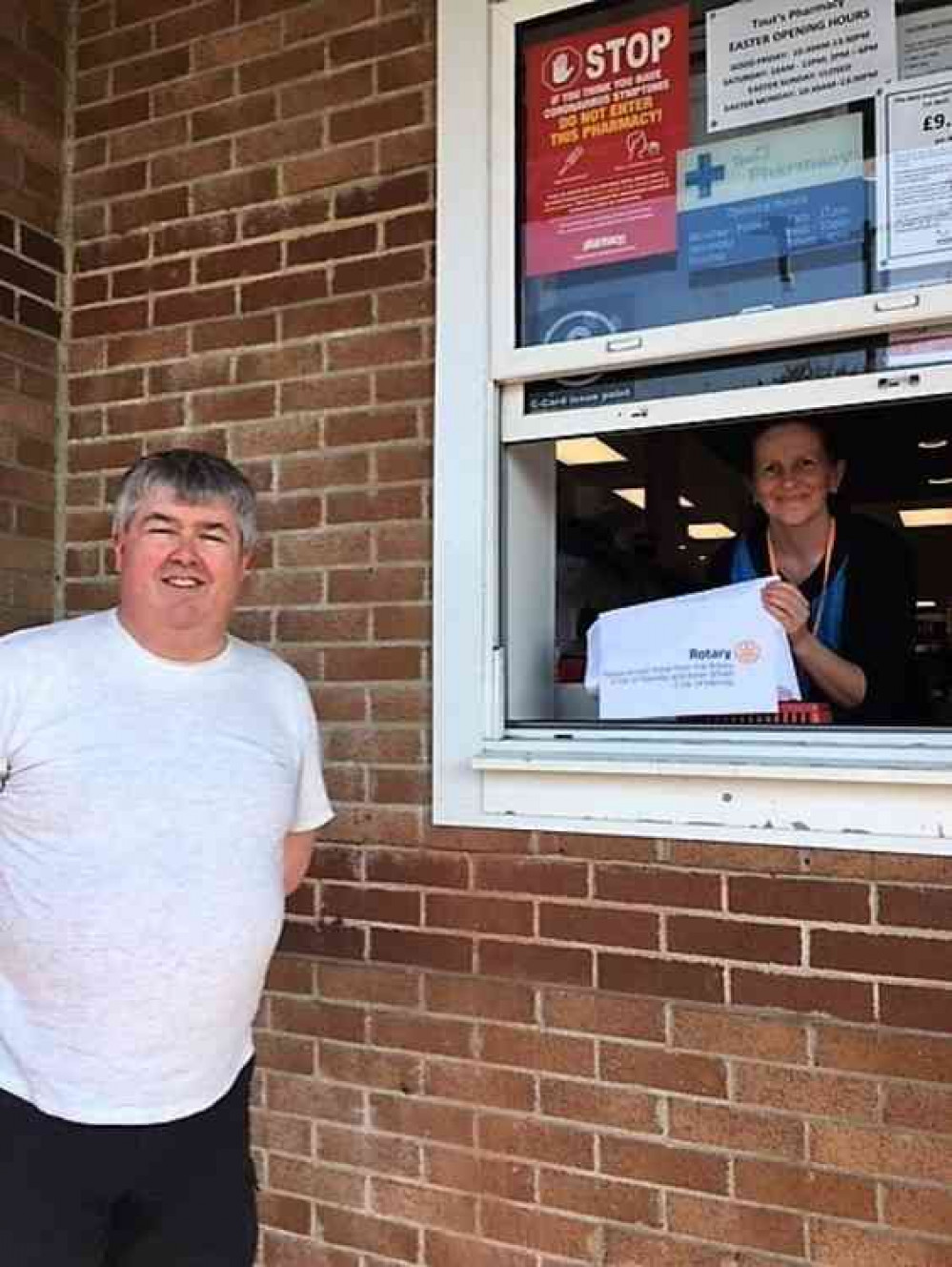 Rotarian Marc Angliss delivering non-surgical facemasks to a Cheddar pharmacy