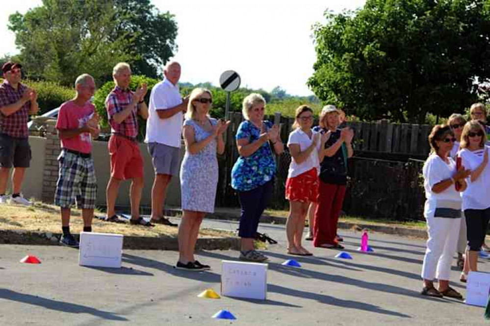 Family, friends and the Blackford Singers cheer on Eric and Nancy (Photo: Simon Painter)