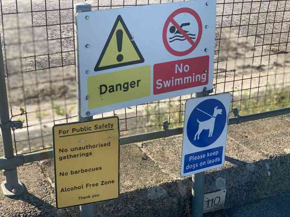 No swimming signs at the reservoir