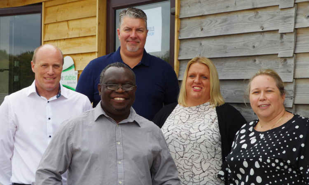 Seren staff outside their new office