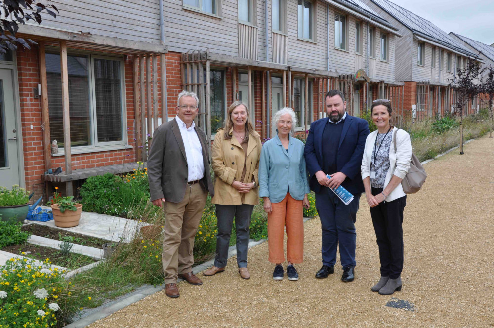 West Dorset MP Chris Loder (second from right) with members of Bridport Cohousing at Hazelmead in Bridport