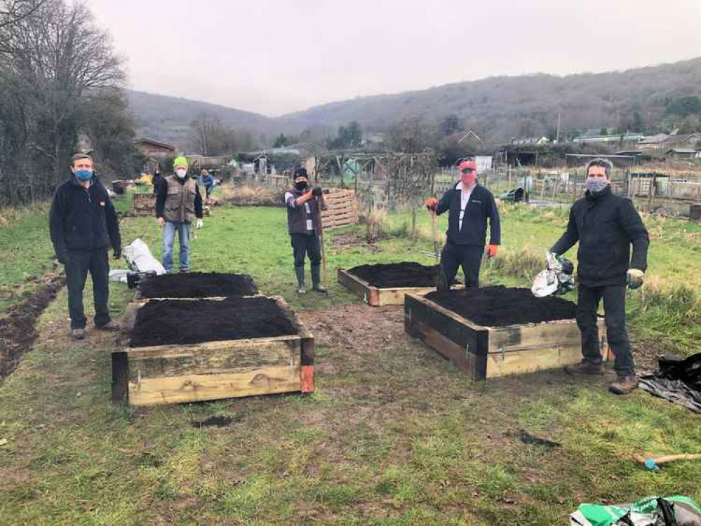 Rotarians and volunteers from The Space charity working on the allotment in Cheddar Rotarians and volunteers from The Space charity working on the allotment in Cheddar