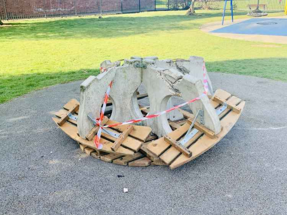 The park's benches were damaged during the incident. The park's benches were damaged during the incident.