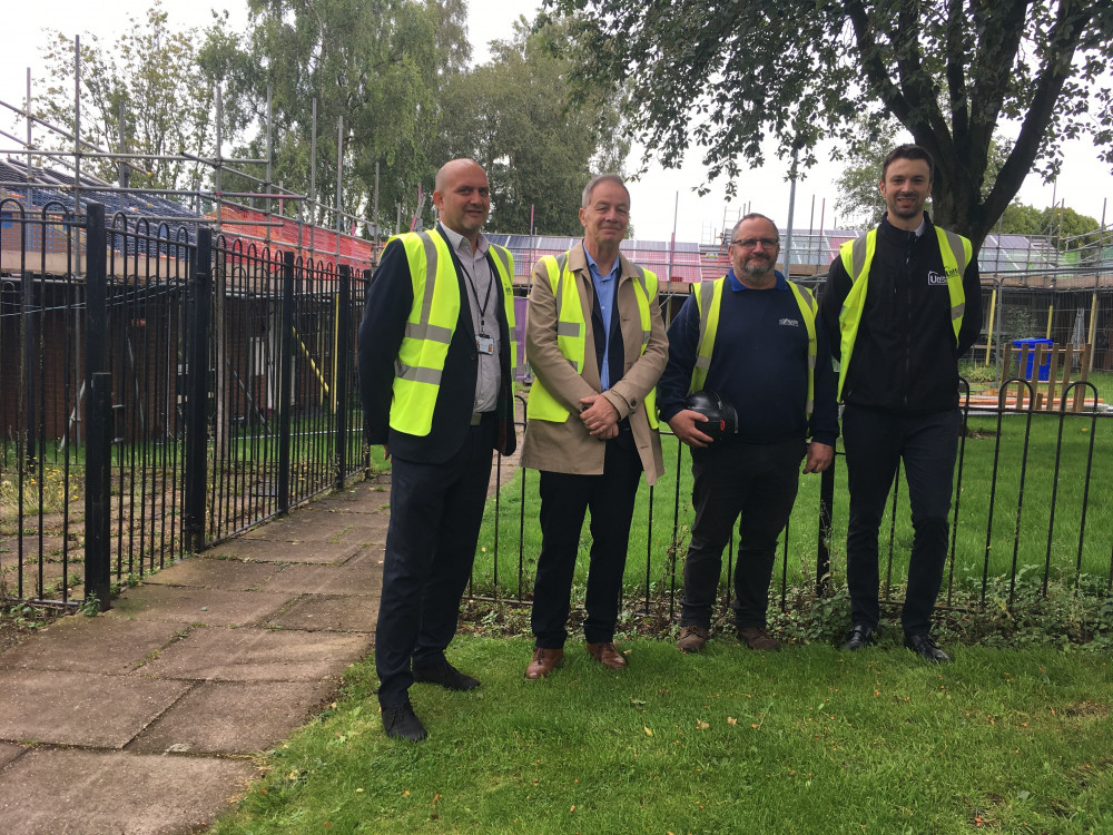 Unitas Director Stephen Garner, Councillor Chris Robinson, Allied Roofing Site Manager Andrew O'Rourke and Unitas Project Manager Stephen Chatterton at an area of Dresden where roofing work is currently taking place (LDRS).