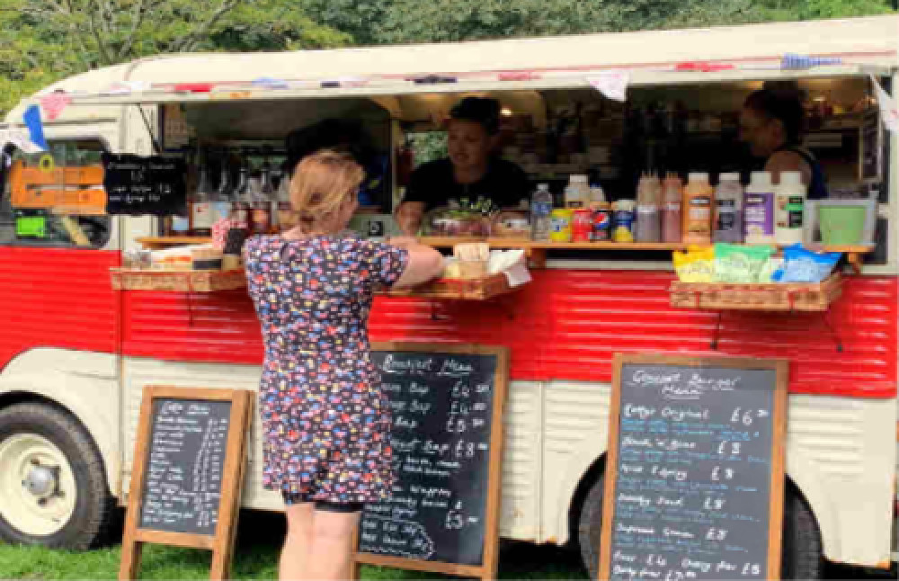 Cllr Jasmine Browne meeting the Moss family at their van on the Rec (image via Wells City Council)