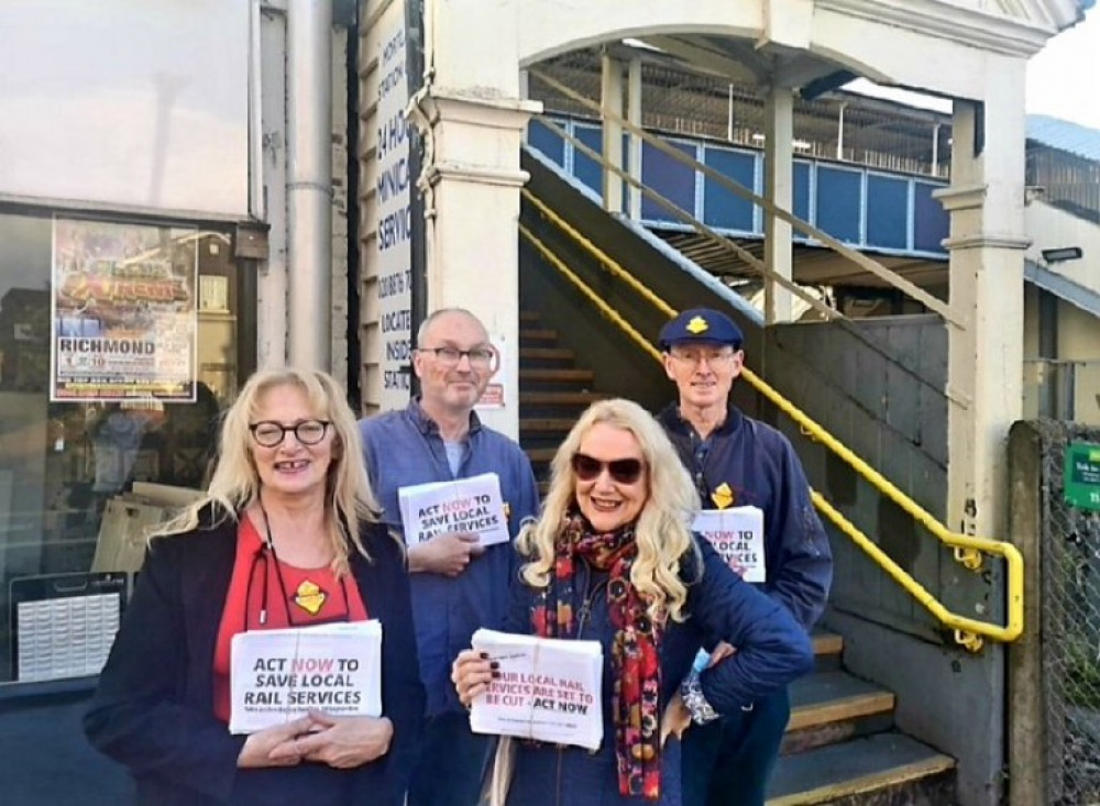 Cllr Julia Cambridge, Cllr Dane and activists next to Mortlake Station. Photo Credit: Cllr Julia Cambridge