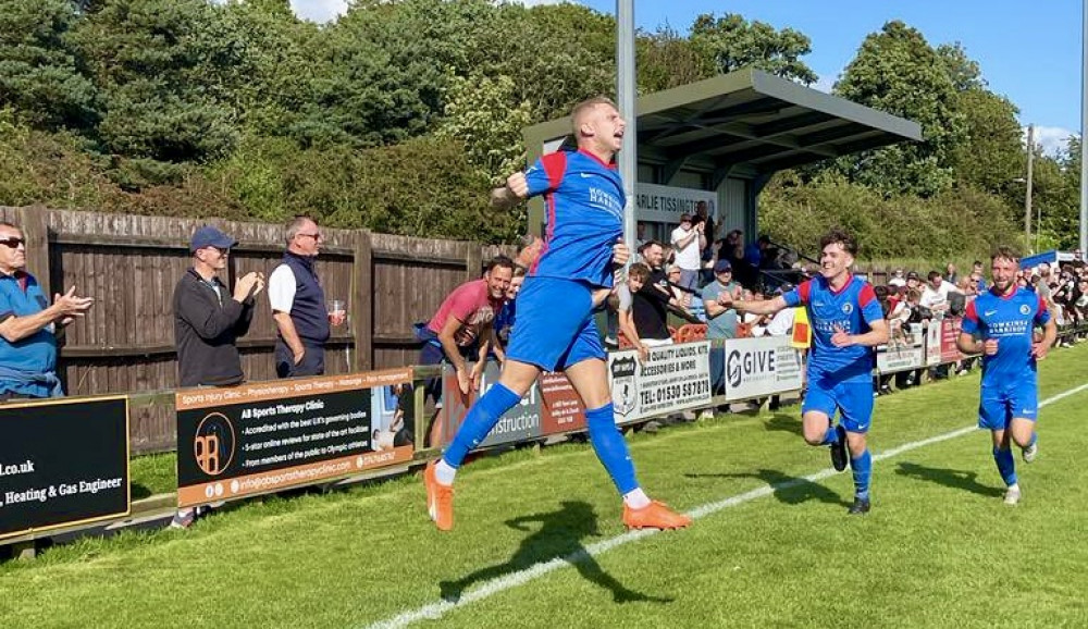 Sam Grouse celebrates Ashby's late winner against Rossington Main. Photo: Josh Kay