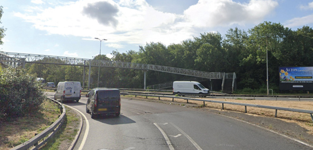 The footbridge from where a brick was thrown.